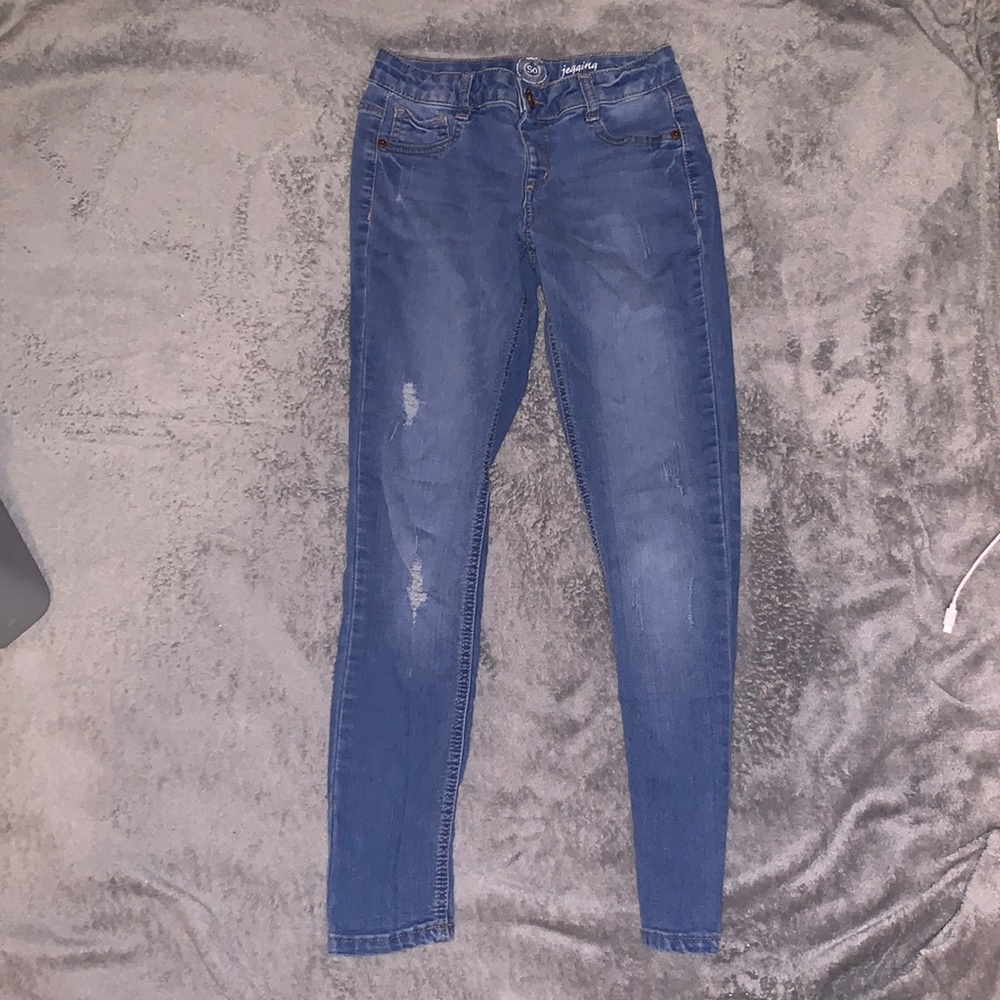 ripped blue jeans